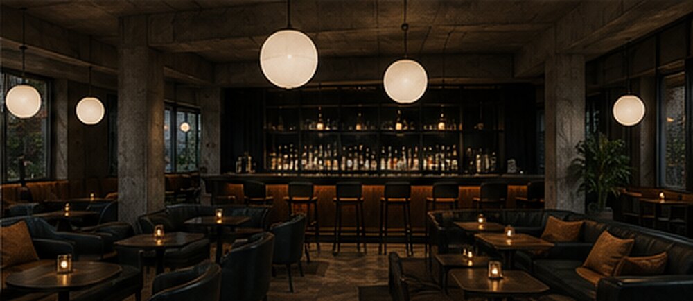 Bar Phizz — globe pendants, concrete columns and low banquette seating